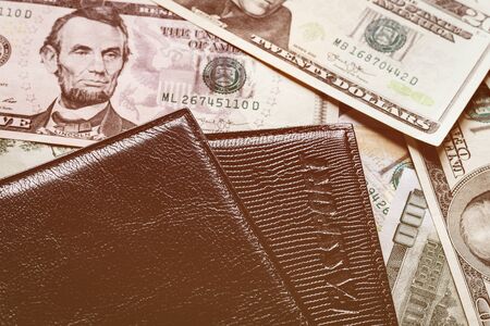 Background with money american dollar bills and passport. Cash dollars.の写真素材