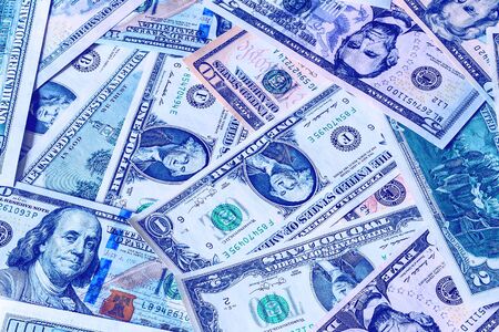 Background with money american dollar bills. Cash dollars isolated on a white.の写真素材