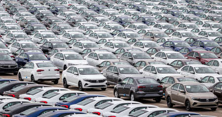 Volkswagen Group Rus, Russia, Kaluga  - MAY 24, 2020: Rows of a new cars parked in a distribution...