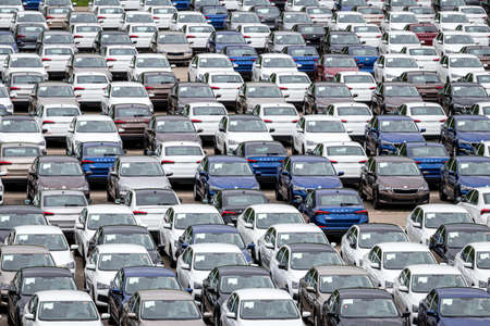 Volkswagen Group Rus, Russia, Kaluga  - MAY 24, 2020: Rows of a new cars parked in a distribution...