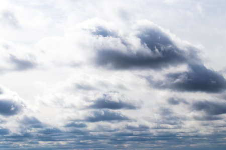 Cumulus clouds in the sky in cloudy weather. Abstract background for design.の写真素材