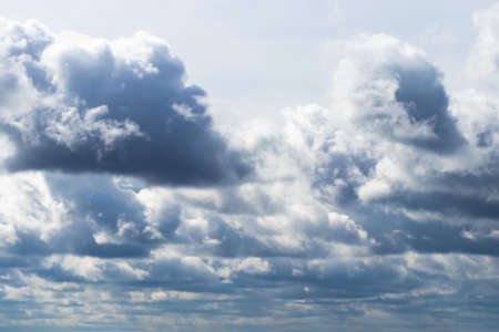 Cumulus clouds in the sky in cloudy weather. Abstract background for design.