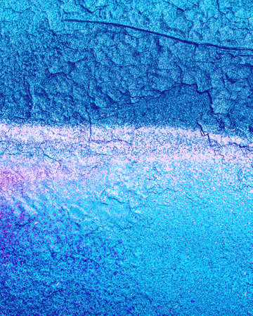 Fragment of colored graffiti painted on a wall. Bright abstract background for design.