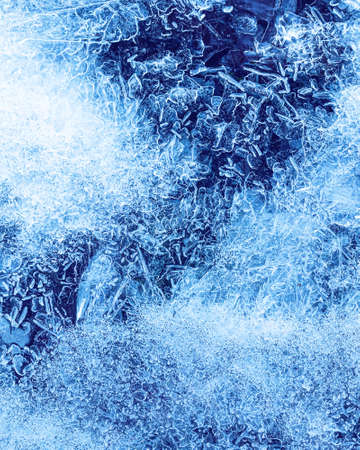 Texture of ice in the winter. Abstract background for design, photographed closeup.