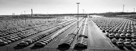Russia, Kaluga - NOVEMBER 12, 2020: Rows of new cars parked in a factory or dealership parking lot...