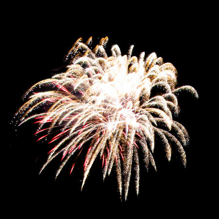 Colorful fireworks isolated on black sky background.の写真素材