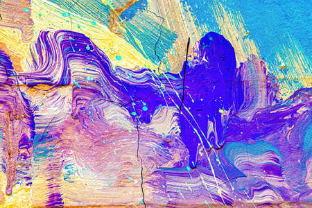 A fragment of colorful graffiti painted on a wall. Abstract urban background for design.の写真素材