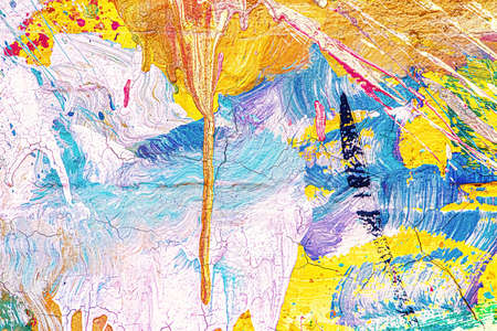 A fragment of colorful graffiti painted on a wall. Abstract urban background for design.