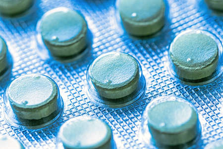 Plate with medical pills close-up.の写真素材