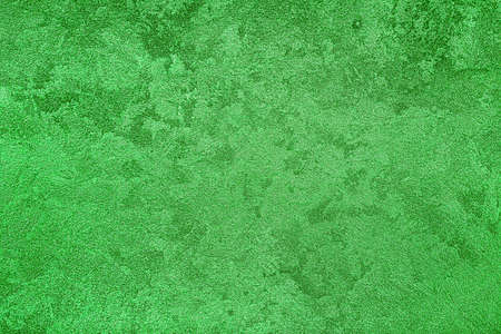 Texture of green decorative plaster or concrete. Abstract grunge background for design.