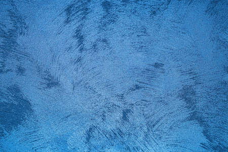 Texture of blue decorative plaster or concrete. Abstract grunge background for design.