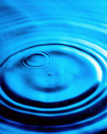 Splashes of water and blurry waves on it.
