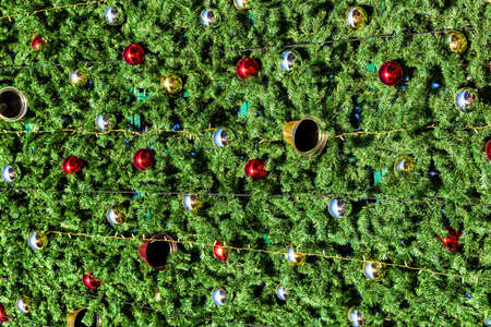 Christmas toys and balls on an artificial spruce. Xmas abstract background.の写真素材