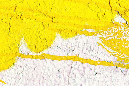 A fragment of colorful graffiti painted on a wall. Abstract urban background for design.
