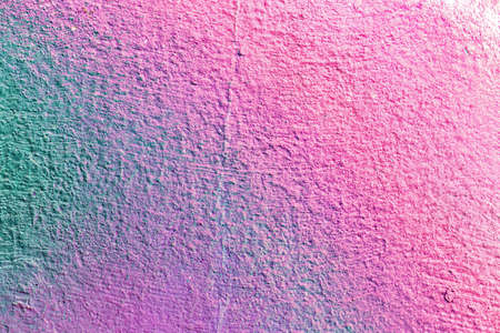 A fragment of colorful graffiti painted on a wall. Abstract urban background for design.の写真素材