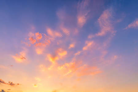 Dramatic cloudy sky at sunset or sunrise. Nature backgroun.の写真素材