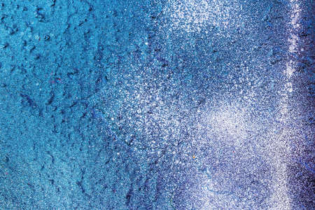 A fragment of colorful graffiti painted on a wall. Abstract urban background for design.