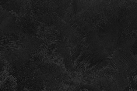 Texture of black decorative plaster or concrete. Abstract grunge background for design.