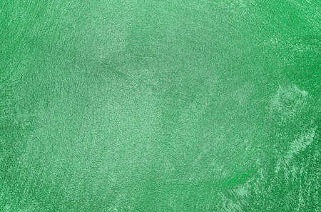 Texture of green decorative plaster or concrete. Abstract grunge background for design.の写真素材