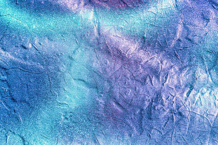 A fragment of colorful graffiti painted on a wall. Abstract urban background for design.の写真素材