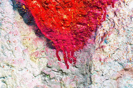 A fragment of colorful graffiti painted on a wall. Abstract urban background for design.の写真素材