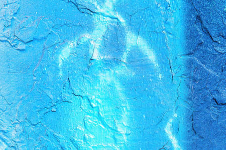 A fragment of colorful graffiti painted on a wall. Abstract urban background for design.の写真素材