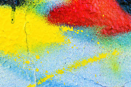 A fragment of colorful graffiti painted on a wall. Abstract urban background for design.の写真素材