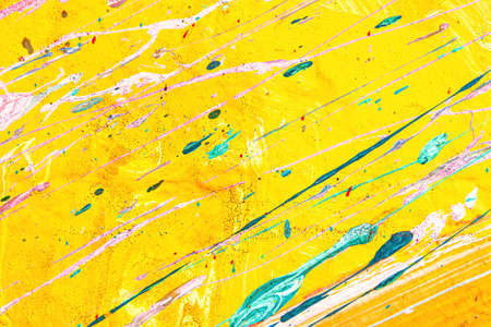 A fragment of colorful graffiti painted on a wall. Abstract urban background for design.の写真素材