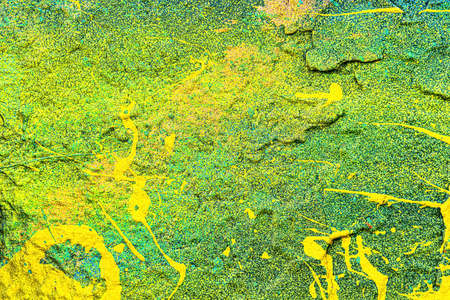 A fragment of colorful graffiti painted on a wall. Abstract urban background for design.の写真素材