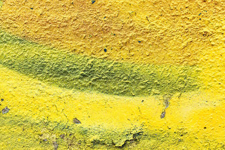 A fragment of colorful graffiti painted on a wall. Abstract urban background for design.の写真素材