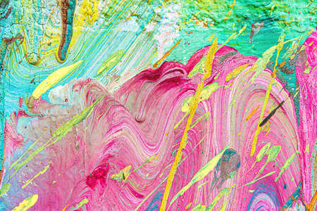 A fragment of colorful graffiti painted on a wall. Abstract urban background for design.の写真素材