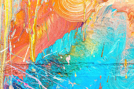 A fragment of colorful graffiti painted on a wall. Abstract urban background for design.の写真素材