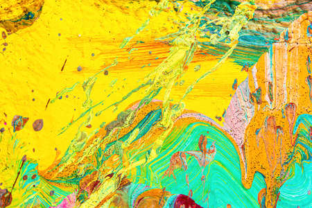 A fragment of colorful graffiti painted on a wall. Abstract urban background for design.の写真素材