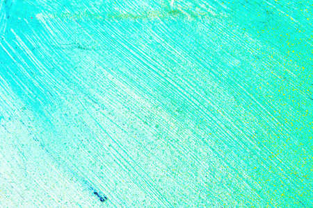 A fragment of colorful graffiti painted on a wall. Abstract urban background for design.