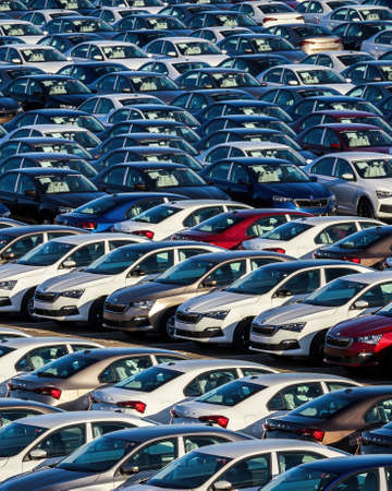 Volkswagen Group Rus, Russia, Kaluga - MAY 25, 2020: Rows of a new cars parked in a distribution...