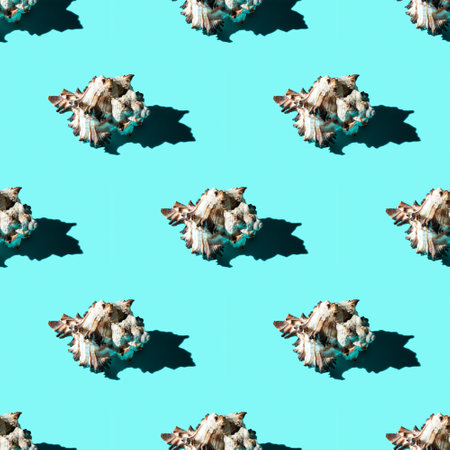 Seamless pattern of clam shells on a cyan background. summertime concept.
