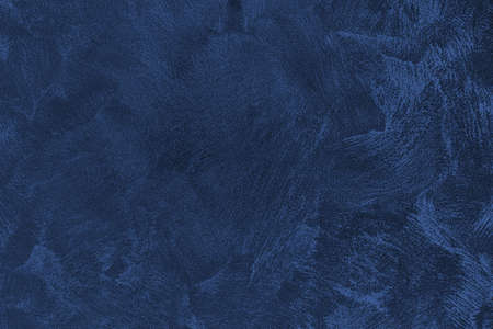 Texture of blue decorative plaster or concrete. Abstract grunge background for design.