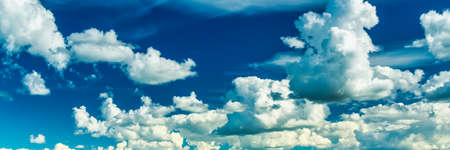White cumulus clouds in the blue sky. cloudy sky background.
