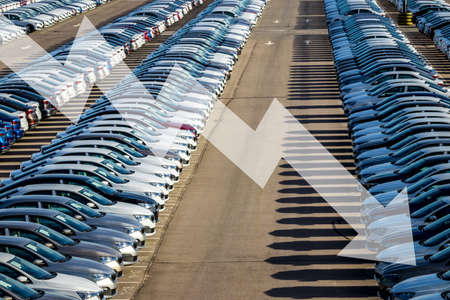 The concept of a decline in car production or prices. Manufacturing crisis or recession crisis in...