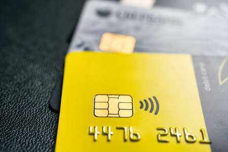 Close-up shot of a debit or credit plastic cards with a chip.の写真素材