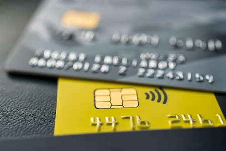 Close-up shot of a debit or credit plastic cards with a chip.の写真素材