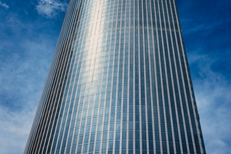 RUSSIA, MOSCOW - JULY 17, 2022: Low angle view of Moscow-City skyscrapers. New business and finance district in Moscow downtown. Tops of modern corporate buildings against the cloudy sky.のeditorial素材