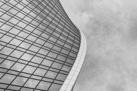 Fragment of a modern office building. Abstract geometric background. Part of the facade of a...