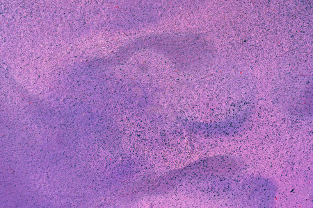 A fragment of colorful graffiti painted on a wall. Abstract urban background for design. spray painting art.の写真素材