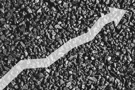 Arrow up on coal background. The concept of price growth, mining, import, export, production, sales or supply of coal.の写真素材