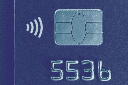 Close-up shot of a debit or credit plastic card with a chip.の写真素材