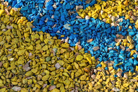 Stones painted with bright colors. abstract background.の写真素材