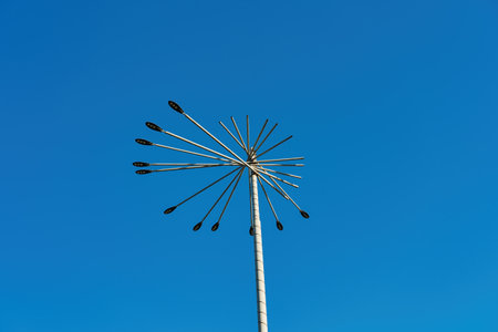Pillar with modern LED lantern against the blue sky.の写真素材