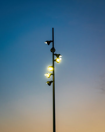 Pillar with lighting modern LED lantern against the twilight sky.の写真素材
