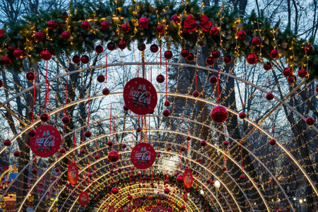 Tashkent, Uzbekistan - December 29, 2022: New Year or Christmas festive balls and garlands hanging in rows on twilight.のeditorial素材